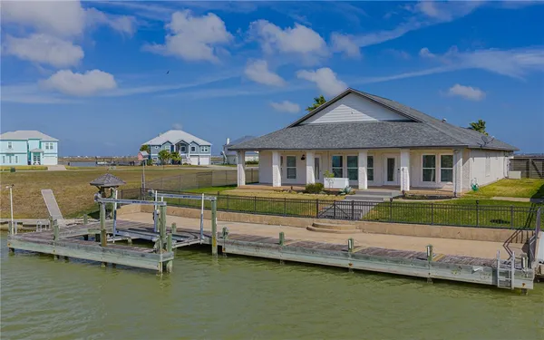 a front view of a house with a boat