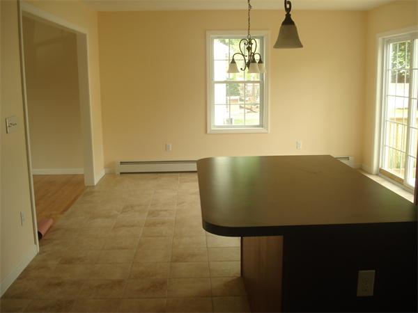 13 Canton Street Springfield, MA 01104 - Photo 5 of 23 a view of a room with windows