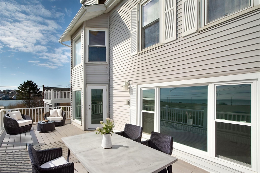 7 Whitehead Avenue, Unit 1 Hull, MA 02045 - Photo 20 of 32 a view of a house with a patio