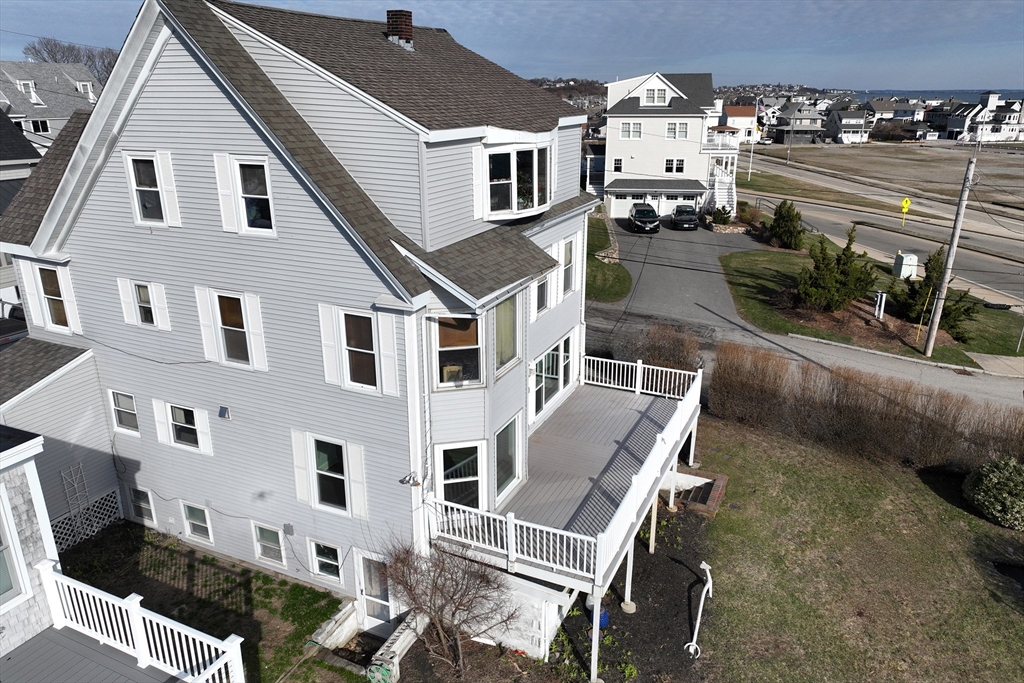 7 Whitehead Avenue, Unit 1 Hull, MA 02045 - Photo 2 of 32 a aerial view of a house with a yard