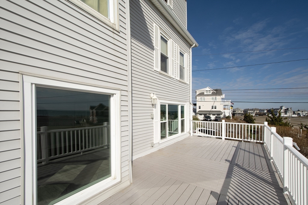 7 Whitehead Avenue, Unit 1 Hull, MA 02045 - Photo 21 of 32 a view of a house with a porch