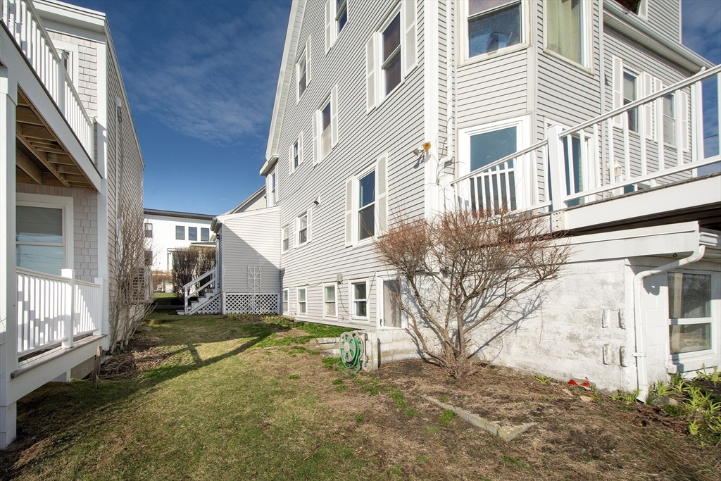 7 Whitehead Avenue, Unit 1 Hull, MA 02045 - Photo 31 of 32 a view of a house with a yard