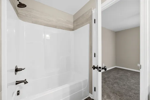 a bathroom with a bathtub