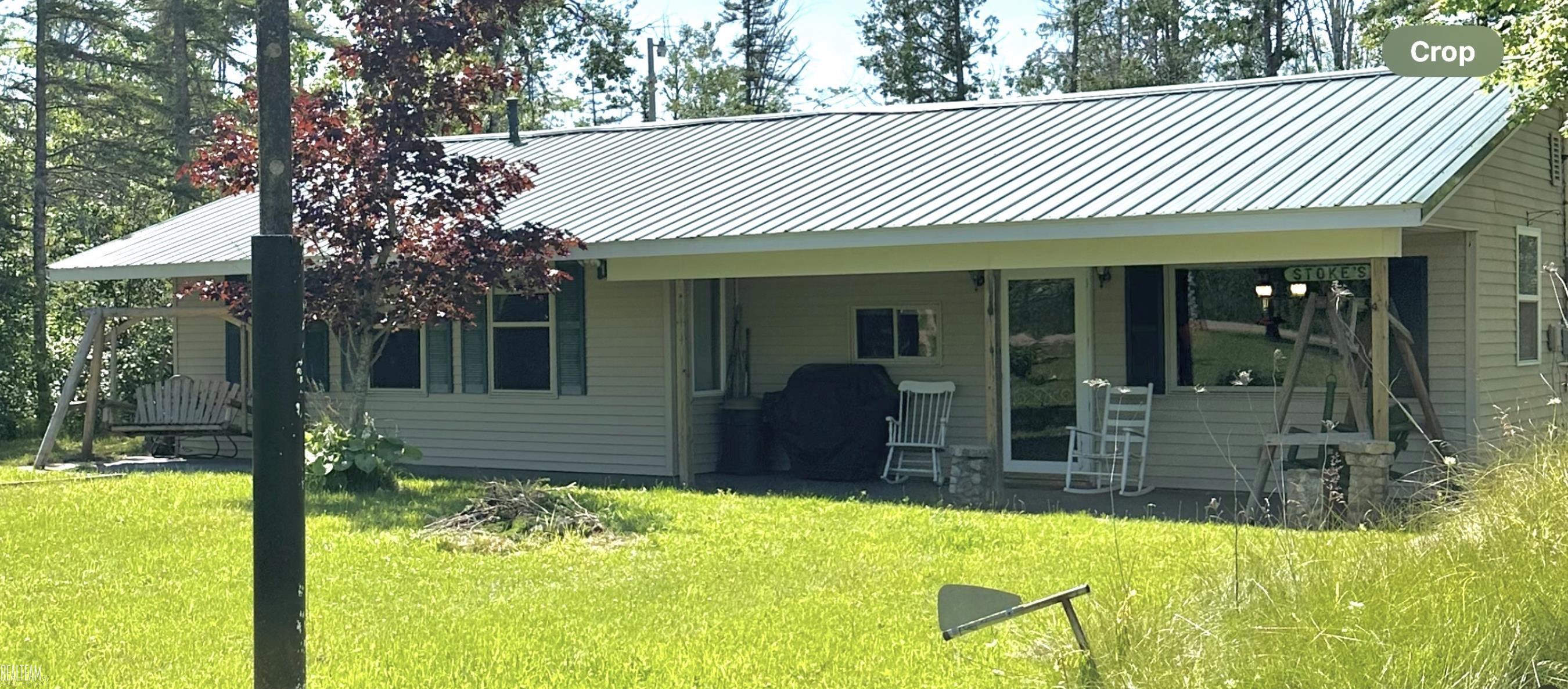 16865 Grace Harbor Road Millersburg, MI 49759 - Photo 1 of 35