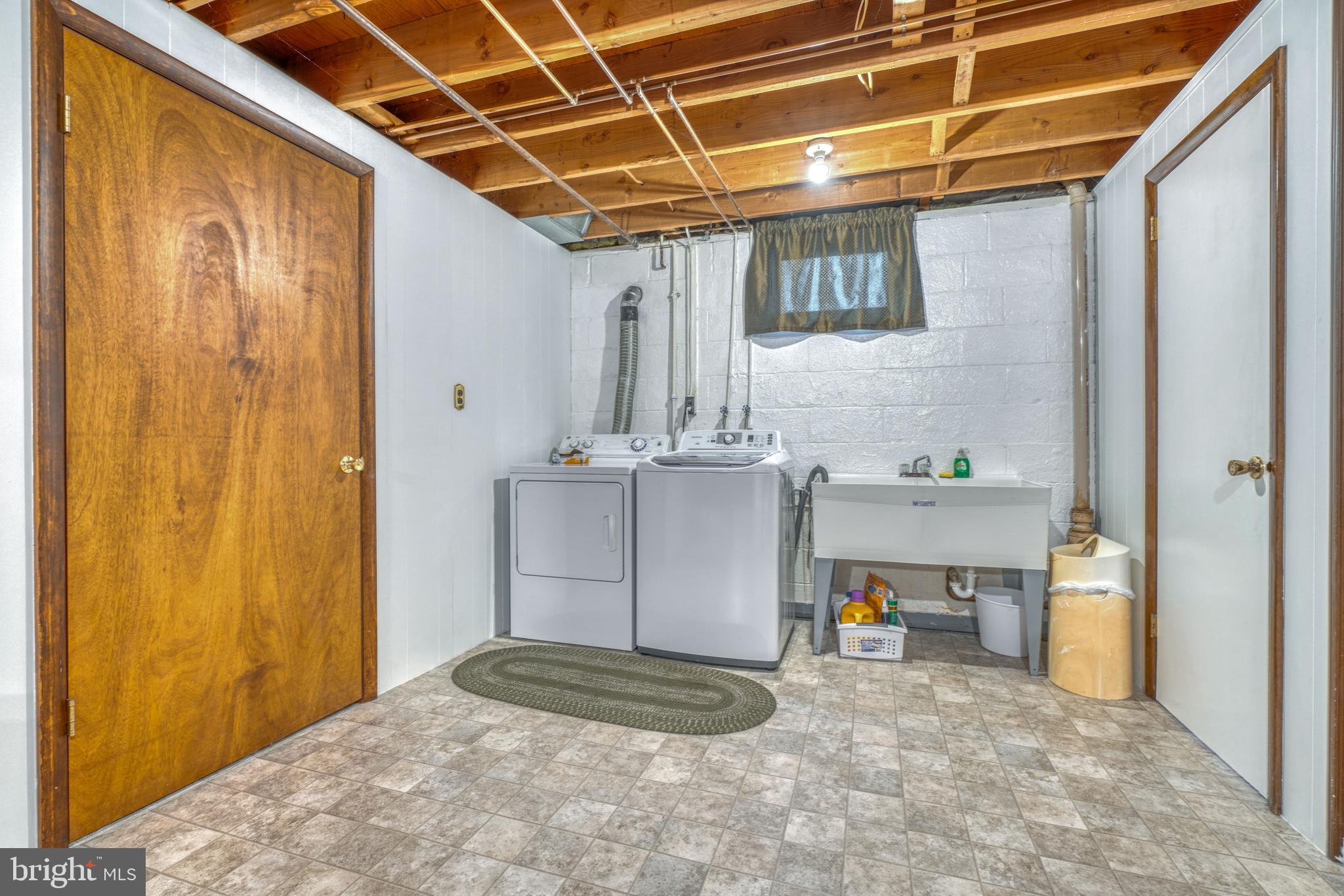 4401 Lobelia Road Nottingham, MD 21236 - Photo 36 of 40 Lower level storage and laundry