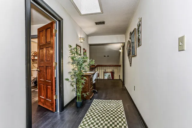 a view of entryway with wooden floor