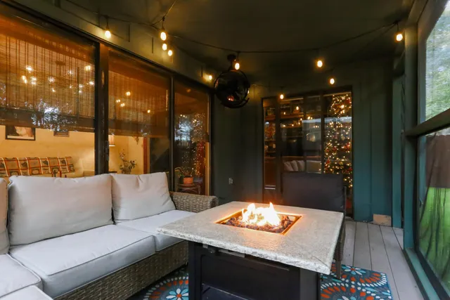 a living room with furniture and a table