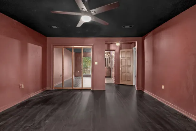 a view of a livingroom with wooden floor
