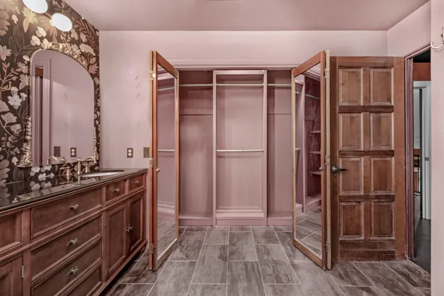 a kitchen with stainless steel appliances a refrigerator and a stove