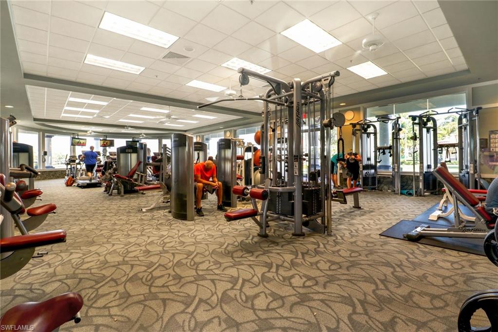 5365 Guadeloupe Way Naples, FL 34119 - Photo 25 of 47 a view of a room with gym equipment