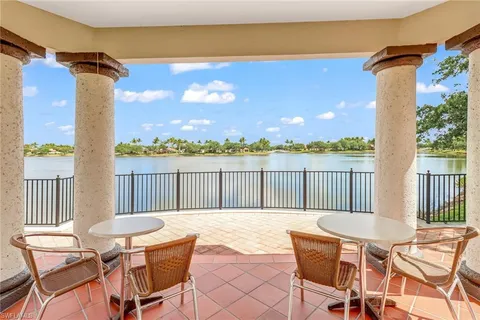 a view of a chairs and table on the terrace