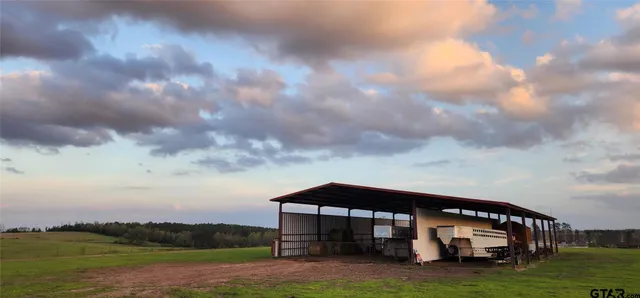a view of an ocean and a yard