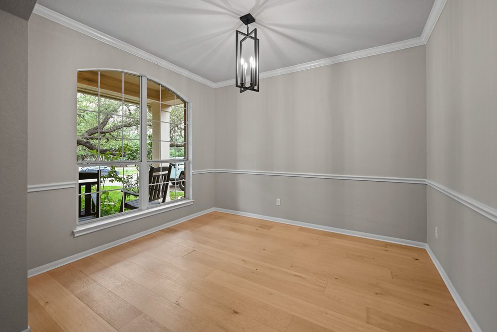2823 Lantana Ridge Drive Austin, TX 78732 - Photo 4 of 34 a view of an empty room with a window