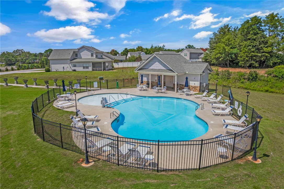 432 Bee Cv Way Pendleton, SC 29670 - Photo 37 of 39 Enjoy leisurely afternoons by the community pool, complete with a charming pavilion and ample lounging space.