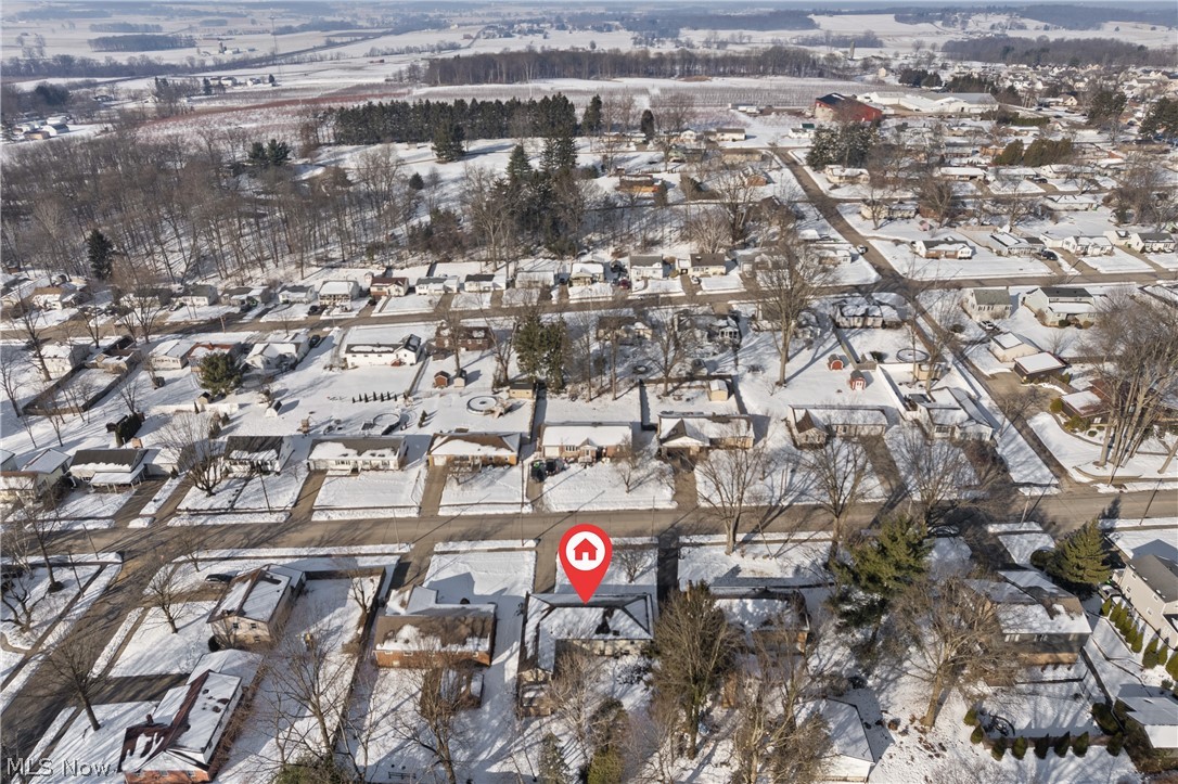 136 South Metzger Avenue Rittman, OH 44270 - Photo 22 of 33 Snowy aerial view with a residential view