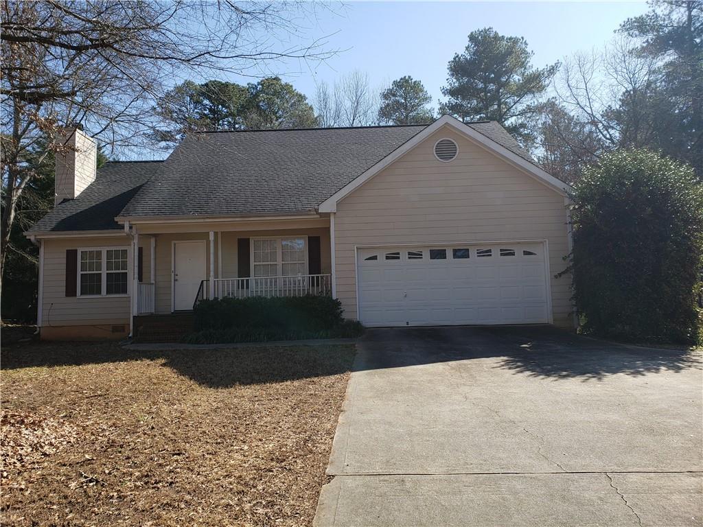 863 Windward Road Winder, GA 30680 - Photo 1 of 1 a front view of a house with a yard