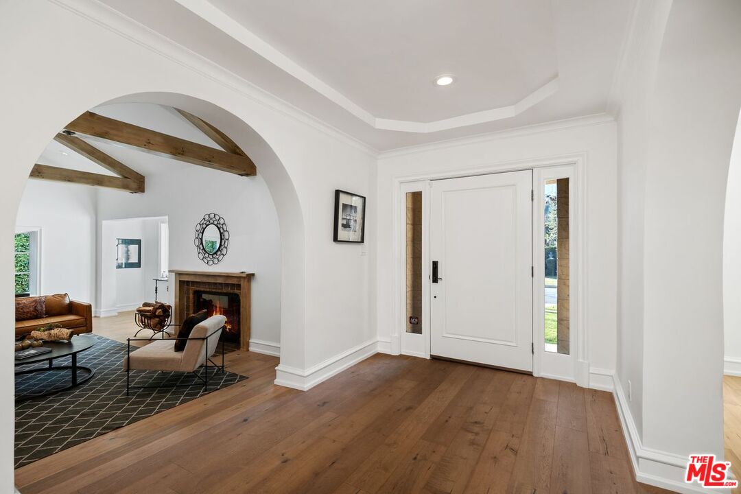 514 Walden Drive Beverly Hills, CA 90210 - Photo 12 of 59 a living room with furniture and a fireplace
