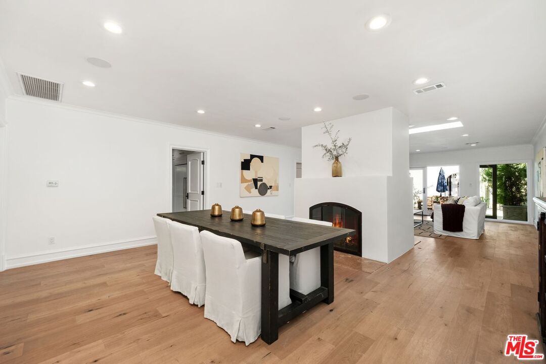 514 Walden Drive Beverly Hills, CA 90210 - Photo 19 of 59 a kitchen with sink and refrigerator
