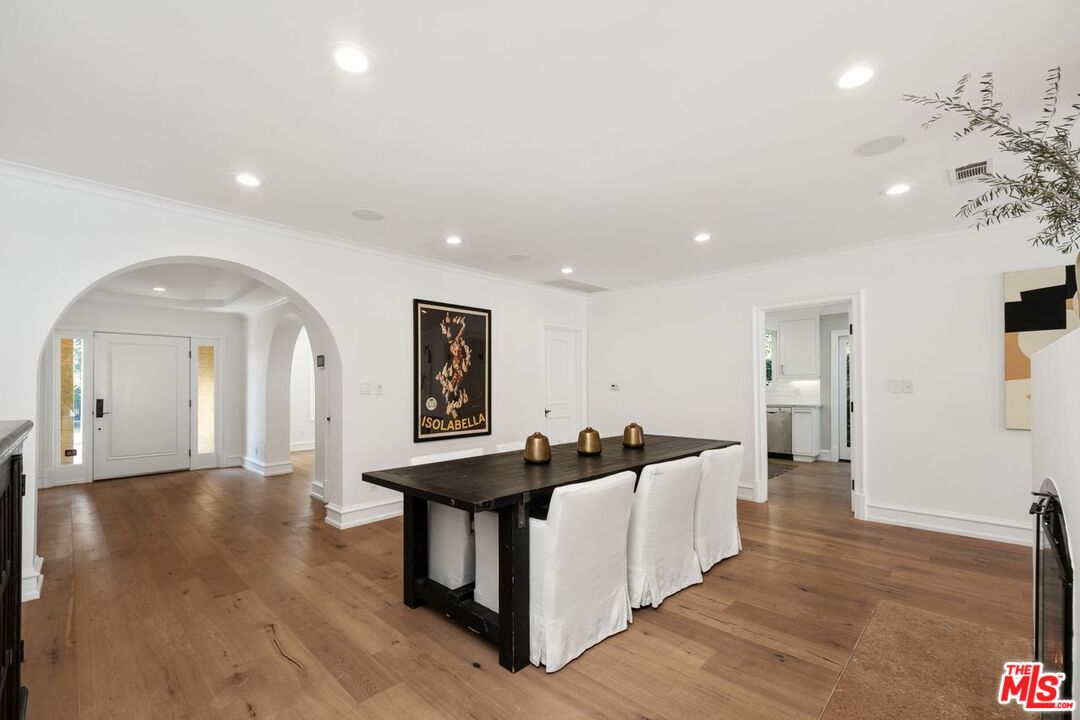 514 Walden Drive Beverly Hills, CA 90210 - Photo 20 of 59 a living room with furniture and a wooden floor