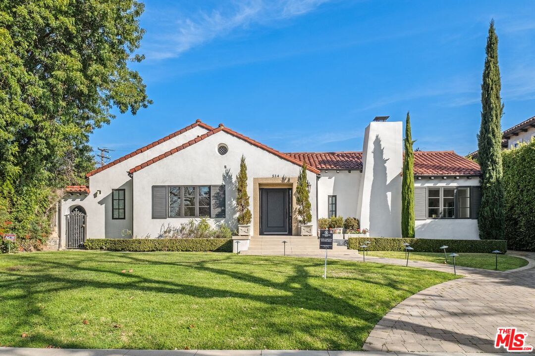 514 Walden Drive Beverly Hills, CA 90210 - Photo 4 of 59 a front view of house with yard and green space