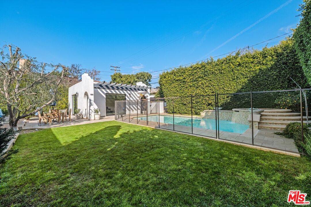 514 Walden Drive Beverly Hills, CA 90210 - Photo 45 of 59 a view of yard with swimming pool and small yard