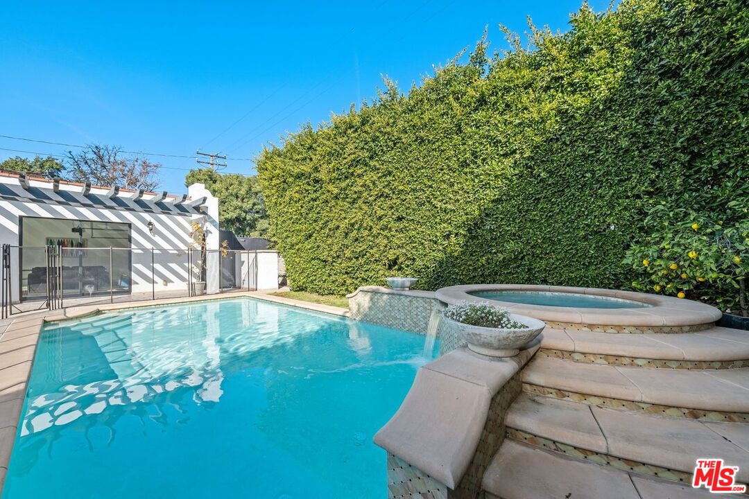 514 Walden Drive Beverly Hills, CA 90210 - Photo 51 of 59 a view of yard with swimming pool and outdoor seating