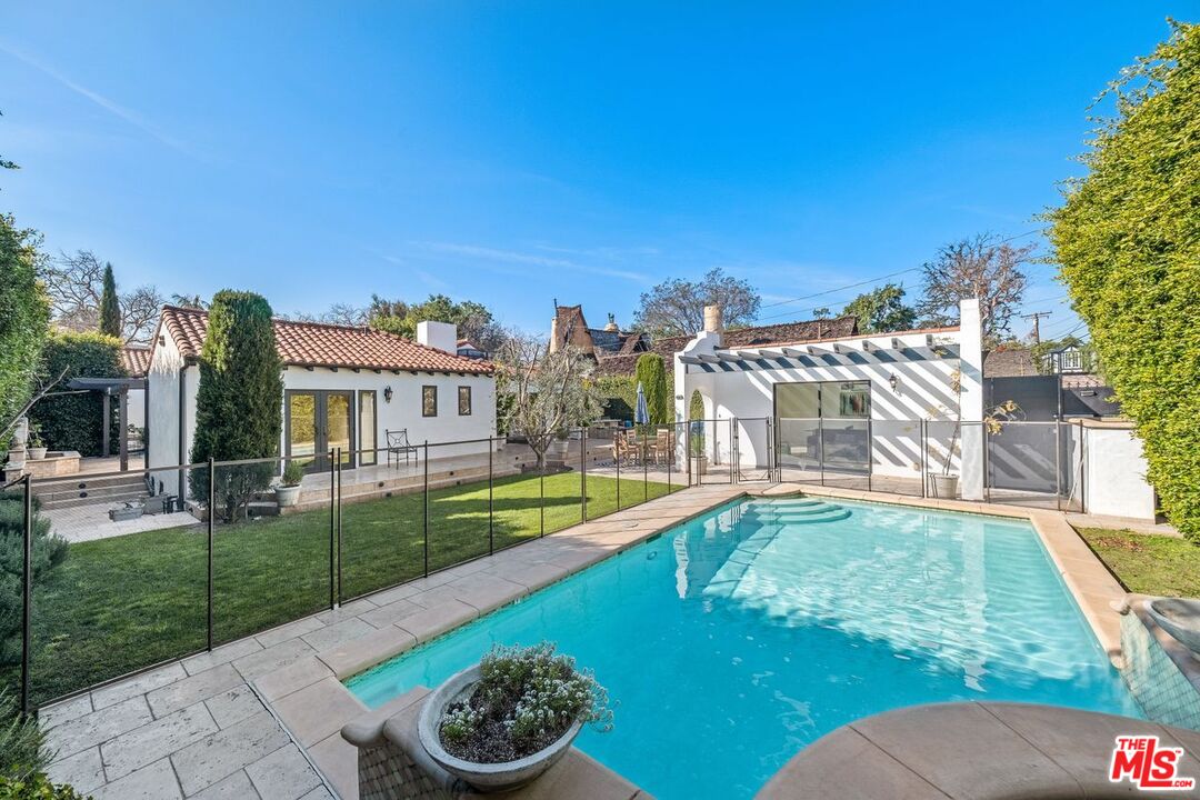 514 Walden Drive Beverly Hills, CA 90210 - Photo 52 of 59 a view of a house with a yard