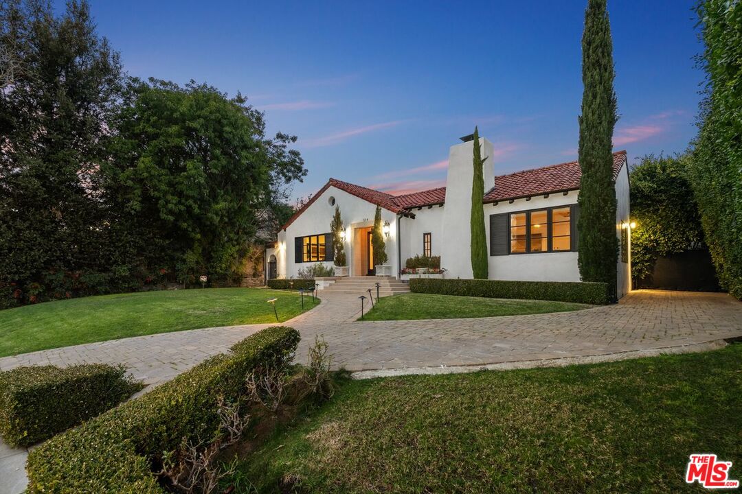 514 Walden Drive Beverly Hills, CA 90210 - Photo 53 of 59 a front view of a house with garden