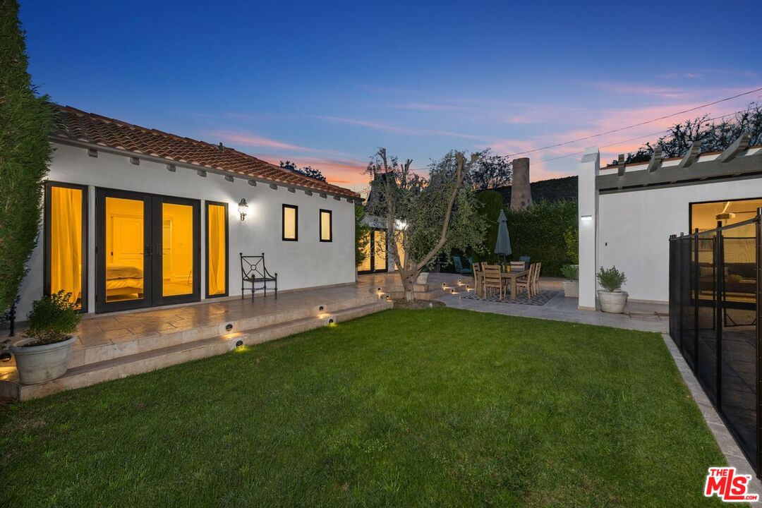 514 Walden Drive Beverly Hills, CA 90210 - Photo 56 of 59 a swimming pool with outdoor seating and yard