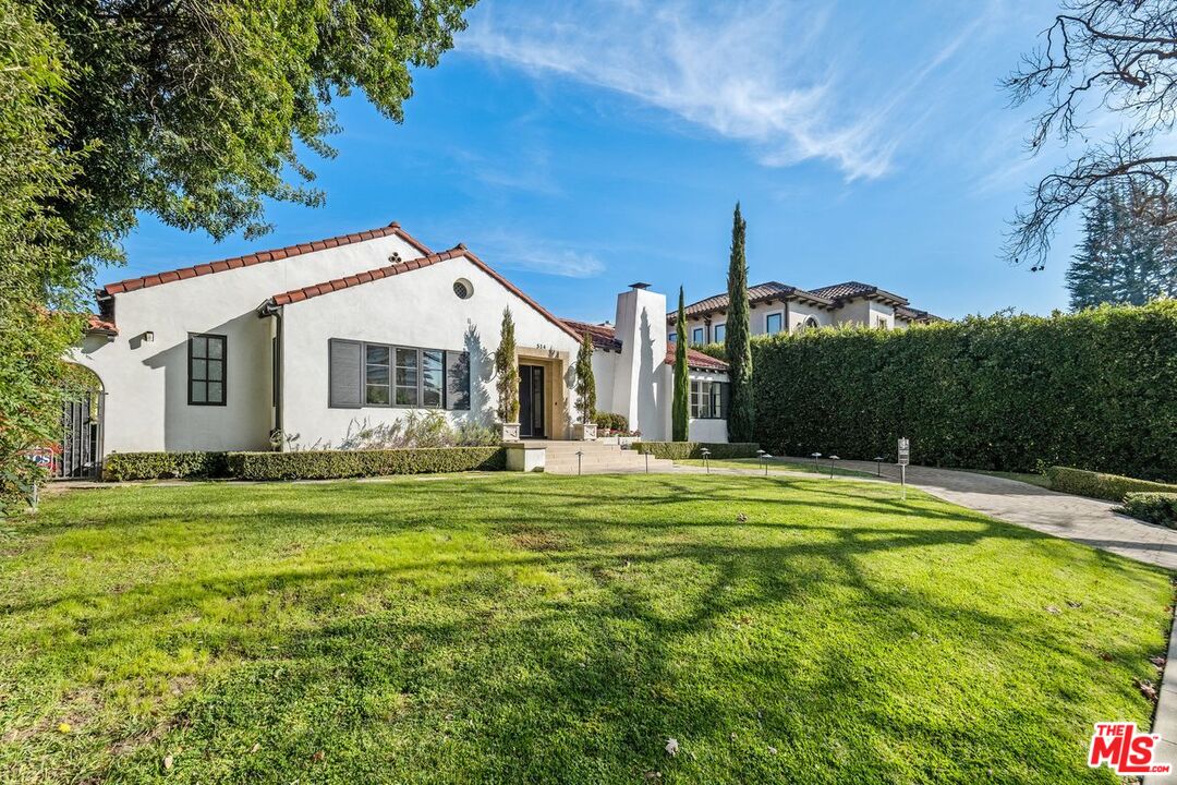 514 Walden Drive Beverly Hills, CA 90210 - Photo 6 of 59 a front view of house with yard and green space