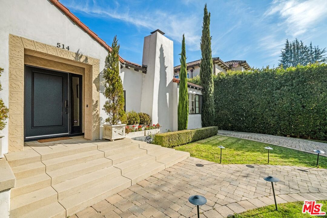 514 Walden Drive Beverly Hills, CA 90210 - Photo 10 of 59 a view of a house with swimming pool