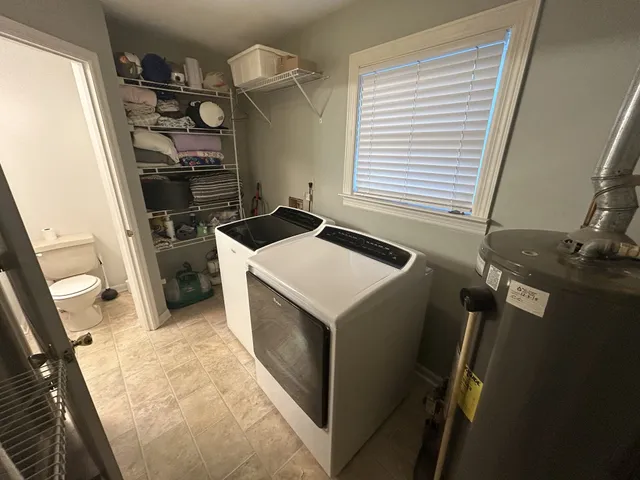 a kitchen that has a sink and a stove