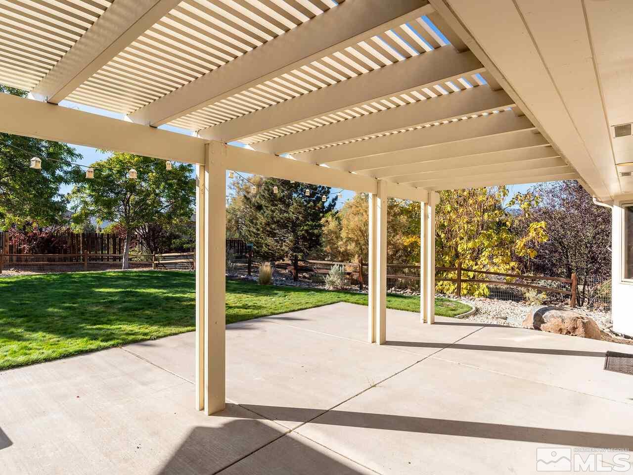 7210 Cheltenham Way Reno, NV 89502 - Photo 21 of 26 a view of a patio with a garden