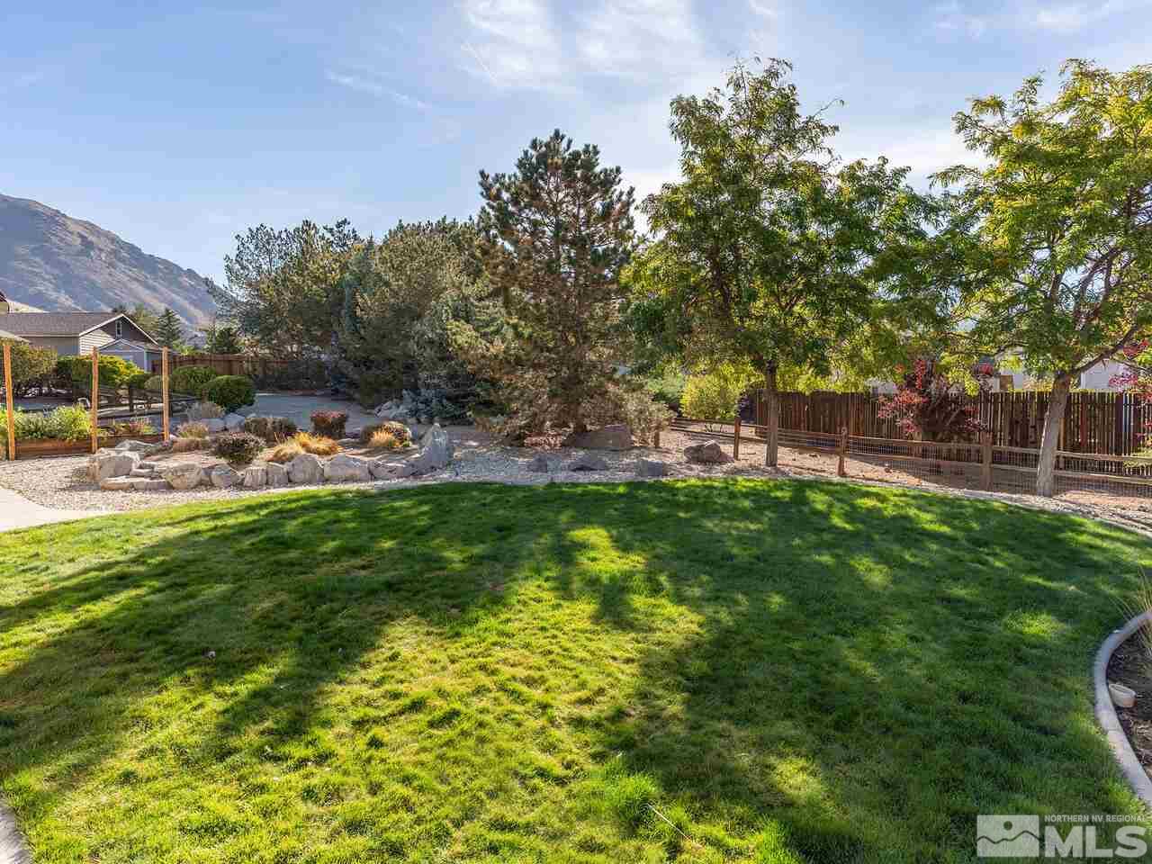 7210 Cheltenham Way Reno, NV 89502 - Photo 22 of 26 a view of yard with green space