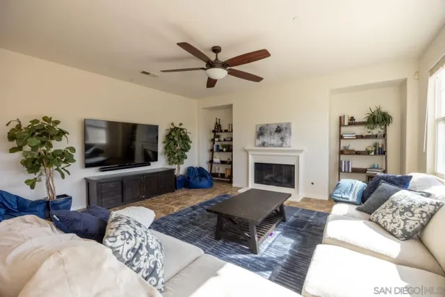 a kitchen with stainless steel appliances kitchen island granite countertop a sink and cabinets