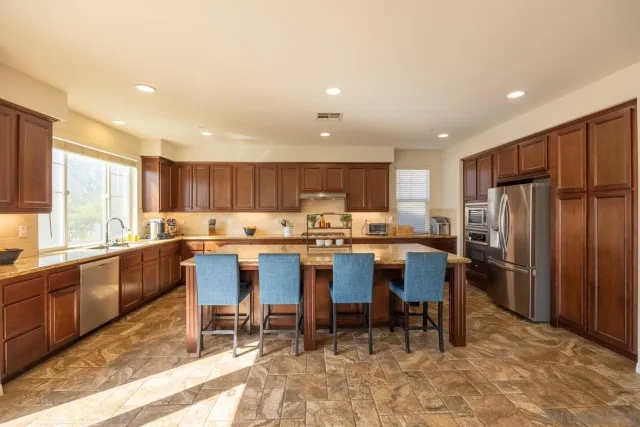 a kitchen with a sink and a window