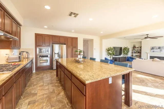 a bathroom with a toilet a sink and a mirror