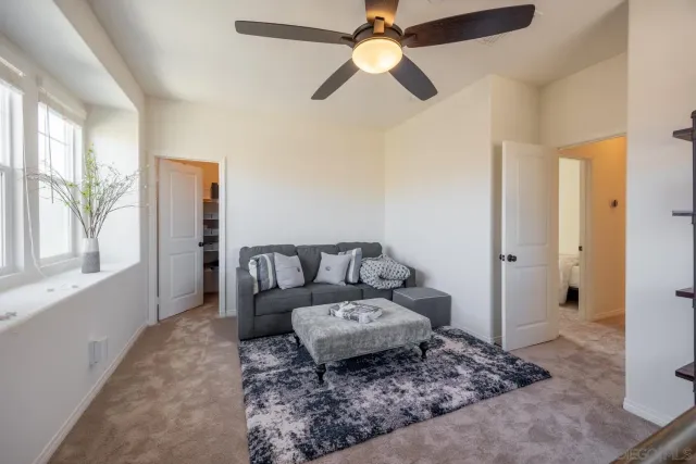 a large bathroom with a sink and a large mirror