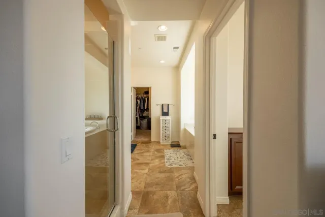 a view of a backyard with sitting area and furniture