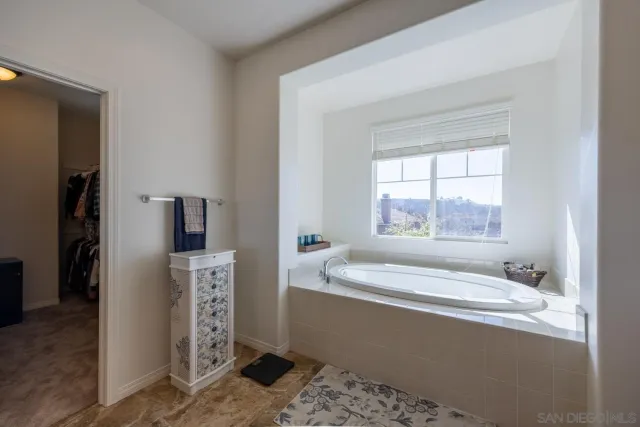 a view of empty room with closet