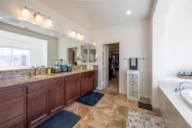 a view of an empty room and a window