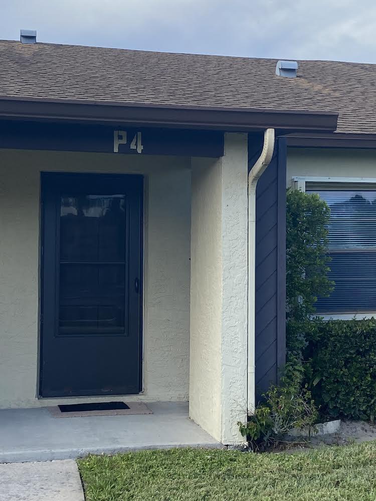 6032 Indrio Road, Unit 4 Fort Pierce, FL 34951 - Photo 1 of 26 Front door