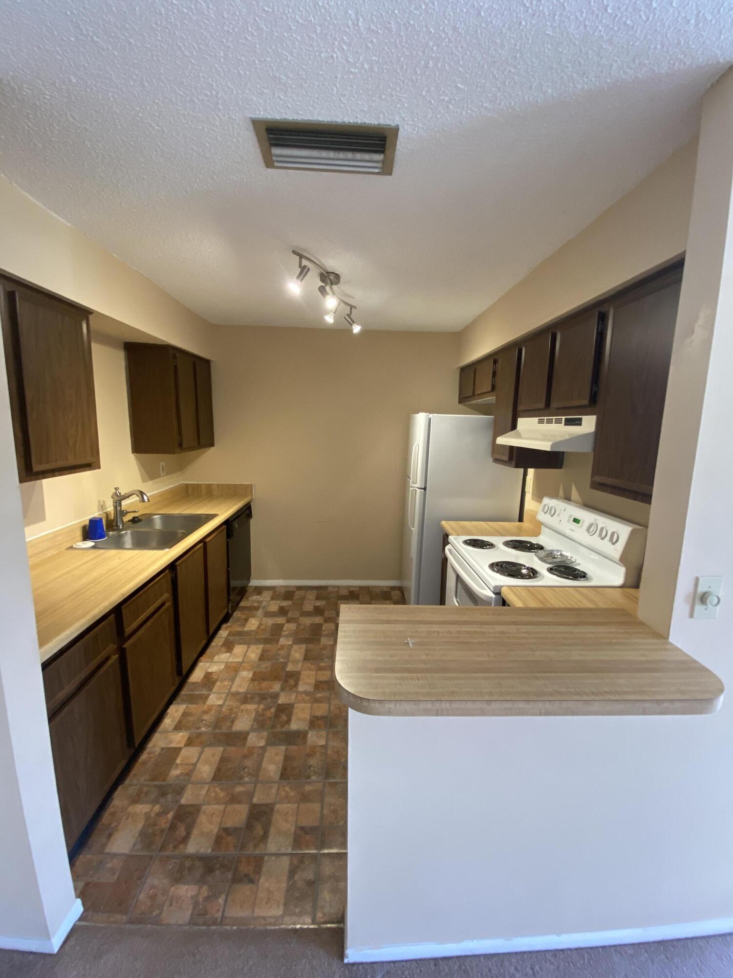 6032 Indrio Road, Unit 4 Fort Pierce, FL 34951 - Photo 12 of 26 Kitchen