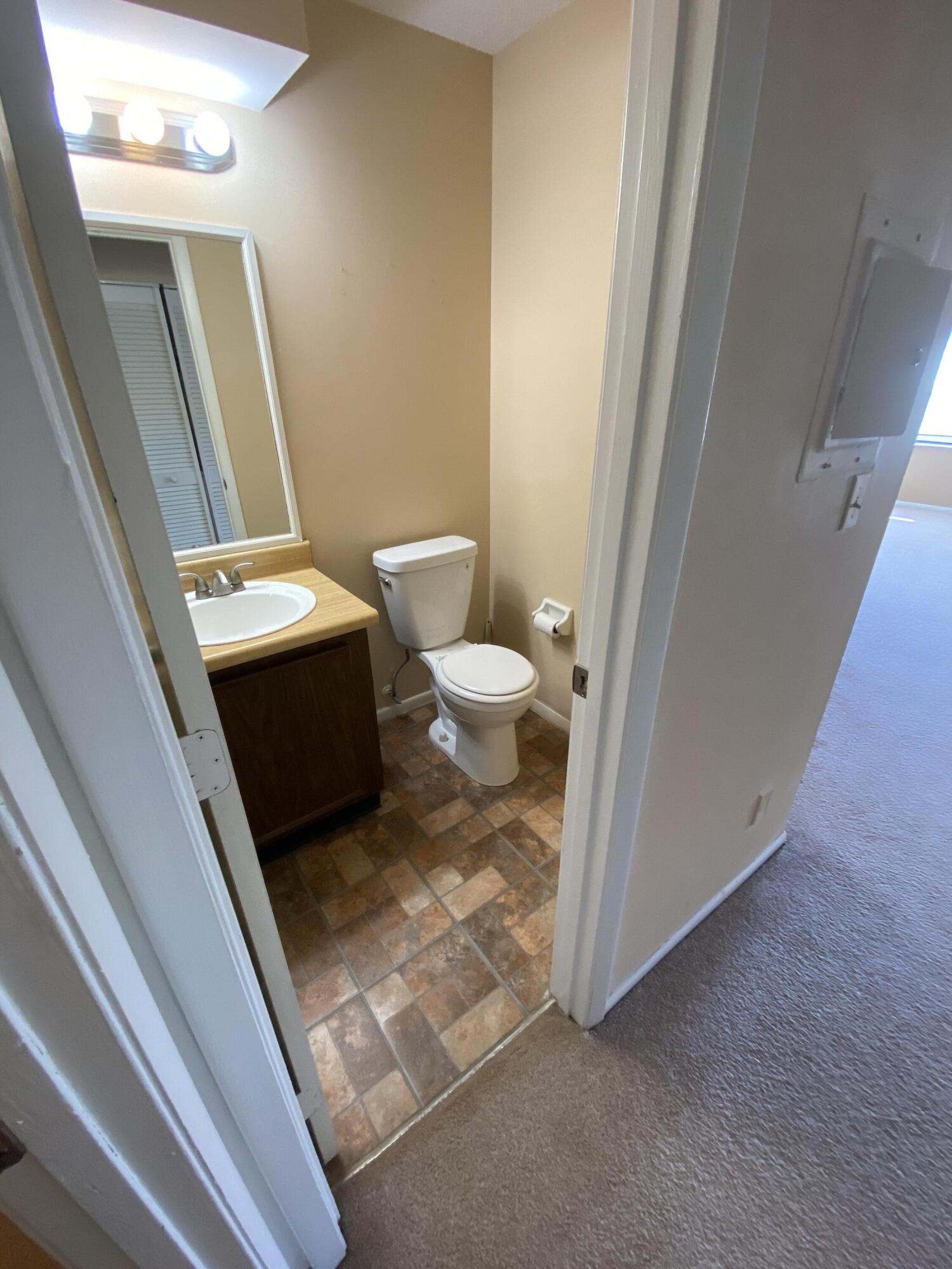 6032 Indrio Road, Unit 4 Fort Pierce, FL 34951 - Photo 15 of 26 Half bath