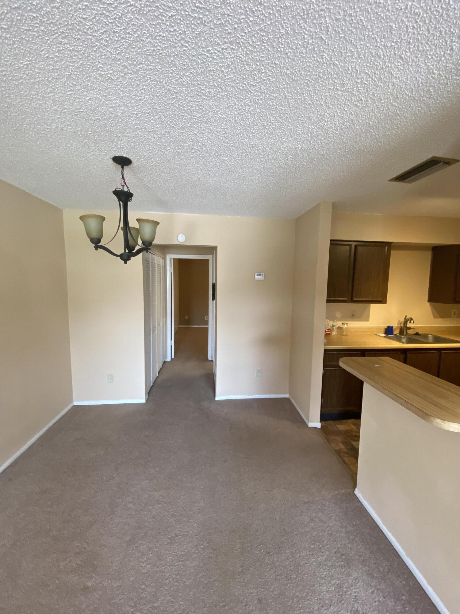 6032 Indrio Road, Unit 4 Fort Pierce, FL 34951 - Photo 8 of 26 Entrance
