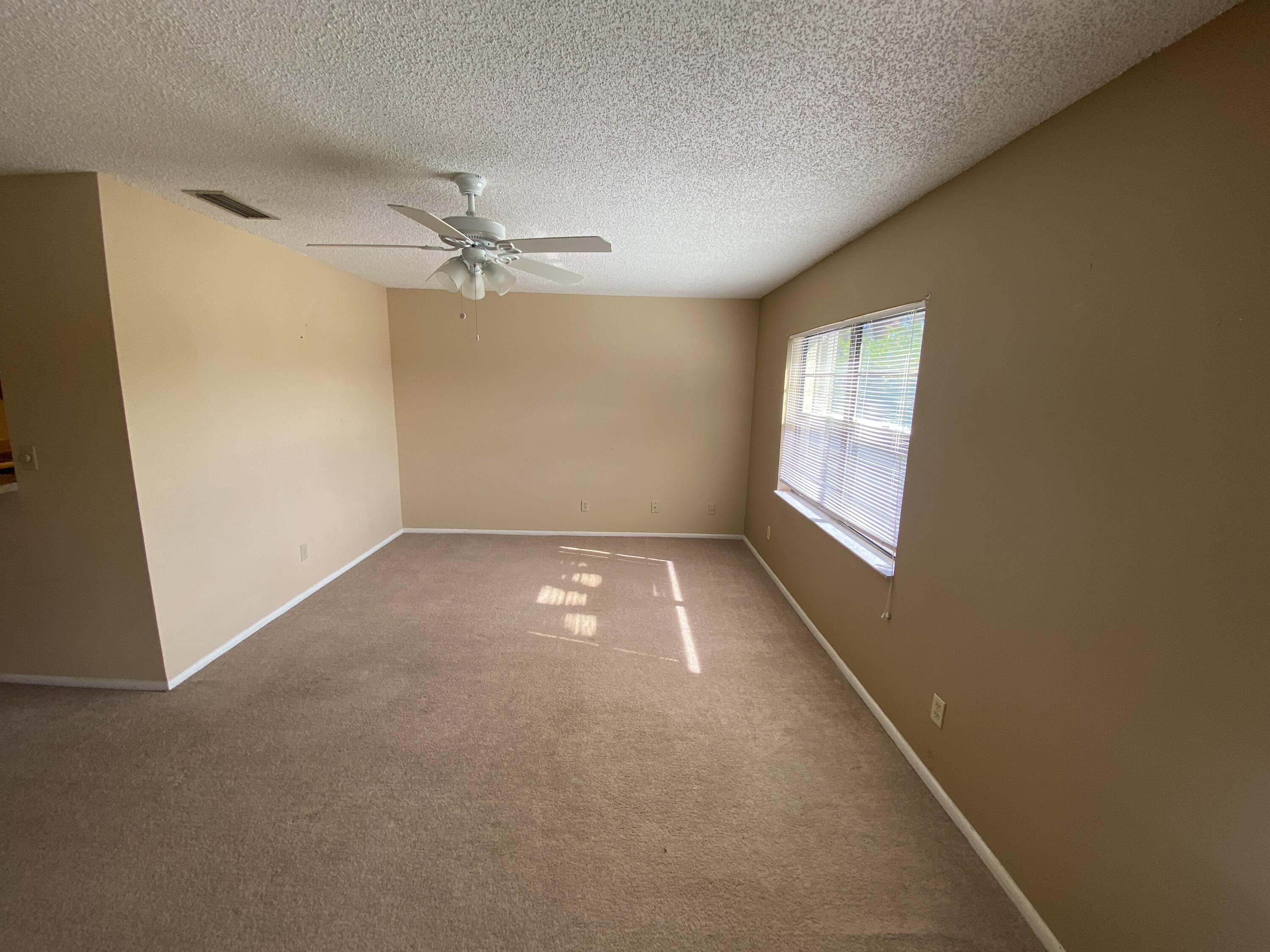 6032 Indrio Road, Unit 4 Fort Pierce, FL 34951 - Photo 9 of 26 Living room