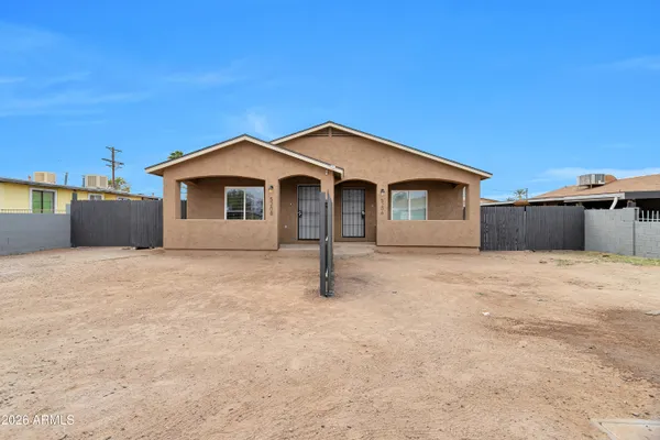 a front view of a house with a garage