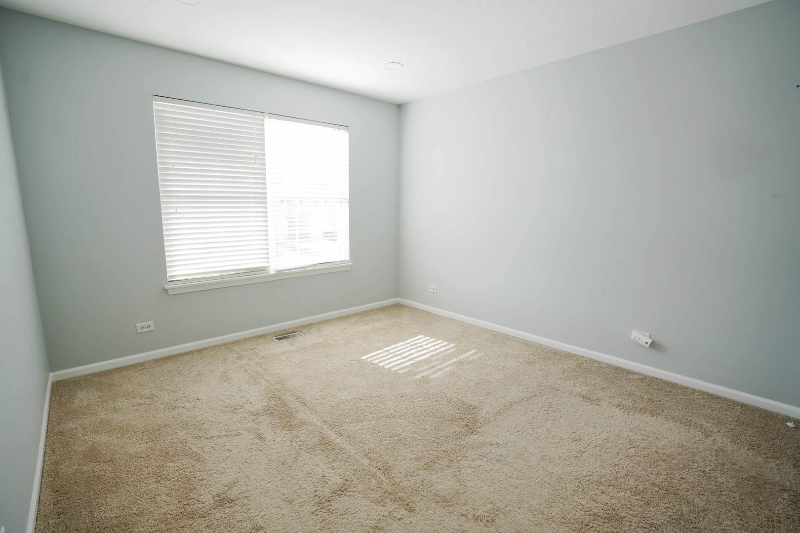 2441 Oneida Lane, Unit 2441 Naperville, IL 60563 - Photo 15 of 21 an empty room with a window