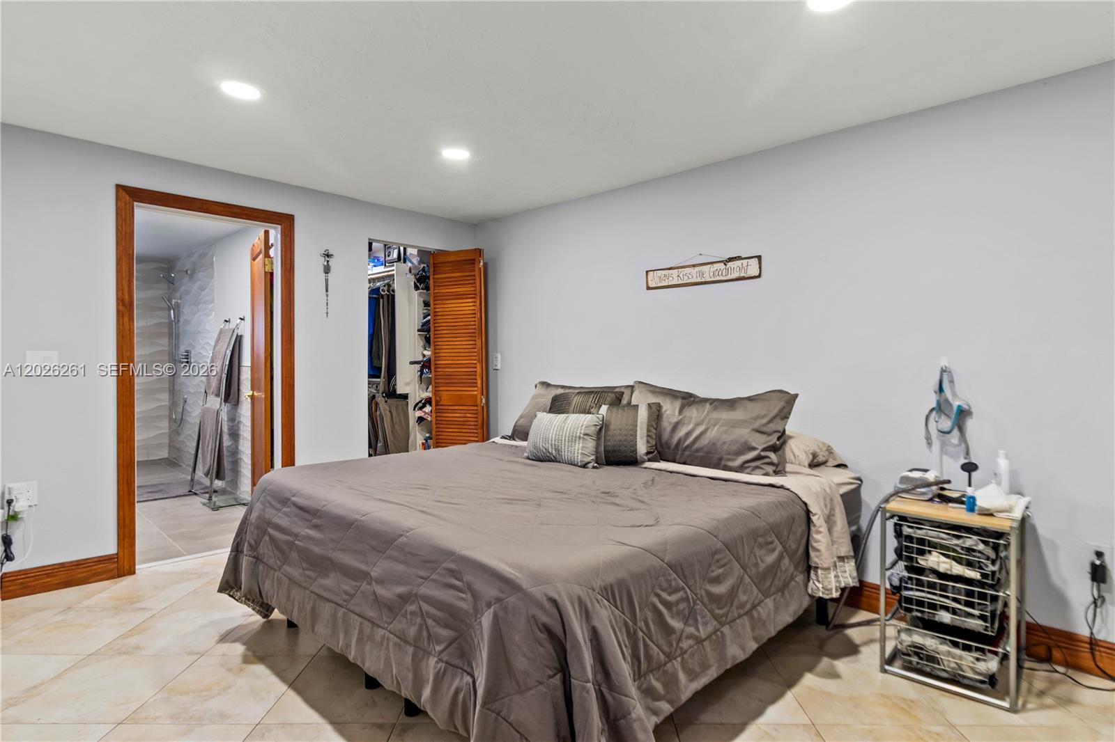 6250 Southwest 20th Terrace Miami, FL 33155 - Photo 26 of 42 a bedroom with a bed and a closet