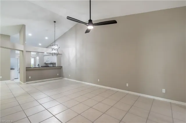 a view of a kitchen with a sink and cabinets